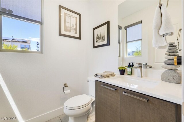 10297 Sierra Skye Ave, Las Vegas, NV 89166 - bathroom with vanity, toilet, and tile patterned floors
