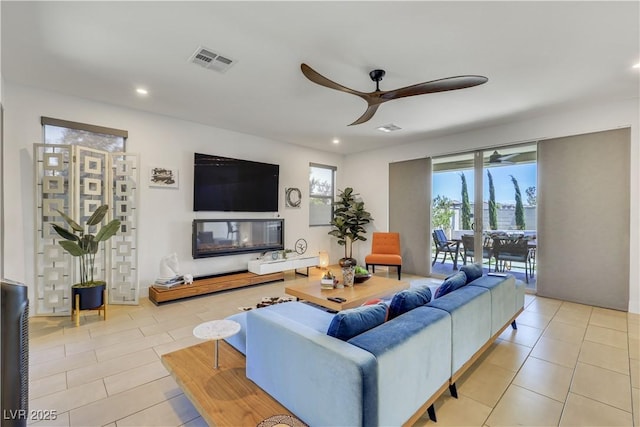 10297 Sierra Skye Ave, Las Vegas, NV 89166 - living room with ceiling fan, tile patterned floors, and recessed lighting