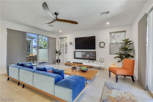 10297 Sierra Skye Ave, Las Vegas, NV 89166 - living room featuring recessed lighting, a ceiling fan, and light tile patterned floors