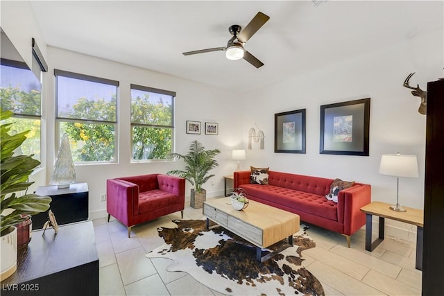 10297 Sierra Skye Ave, Las Vegas, NV 89166 - living area with ceiling fan, light tile patterned flooring, and baseboards