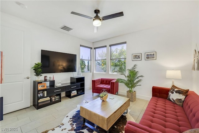 10297 Sierra Skye Ave, Las Vegas, NV 89166 - living room featuring ceiling fan and light tile patterned floors