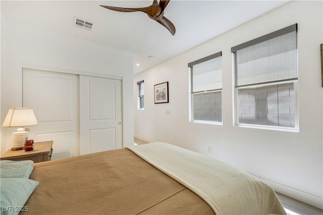 10297 Sierra Skye Ave, Las Vegas, NV 89166 - bedroom with a closet, ceiling fan, and recessed lighting