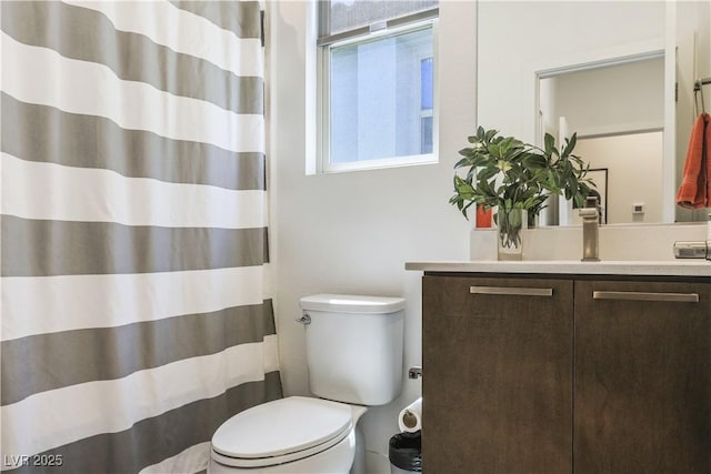 10297 Sierra Skye Ave, Las Vegas, NV 89166 - full bathroom featuring toilet, vanity, and a shower with shower curtain