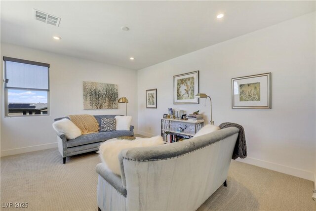 10297 Sierra Skye Ave, Las Vegas, NV 89166 - living room featuring light carpet, baseboards, and recessed lighting