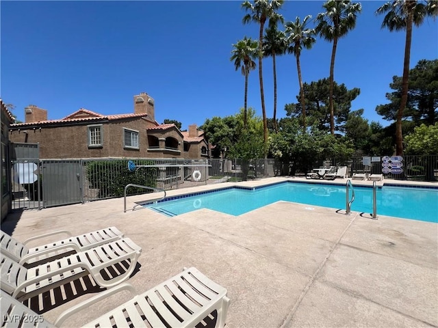 5260 Mission Monterey Ln Unit 208, Las Vegas, NV 89107 - community pool with a patio