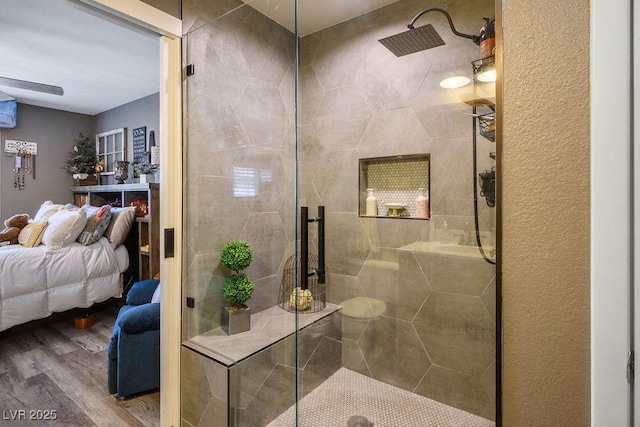 8884 Perfect Diamond Ct, Las Vegas, NV 89129 - ensuite bathroom with wood finished floors and a stall shower