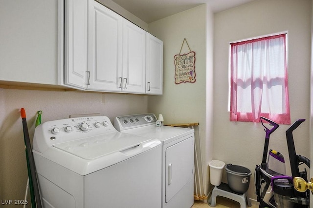 8884 Perfect Diamond Ct, Las Vegas, NV 89129 - laundry area with washing machine and clothes dryer and cabinet space