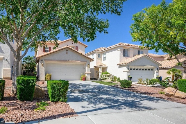 8884 Perfect Diamond Ct, Las Vegas, NV 89129 - mediterranean / spanish house with driveway, an attached garage, stucco siding, and a tile roof