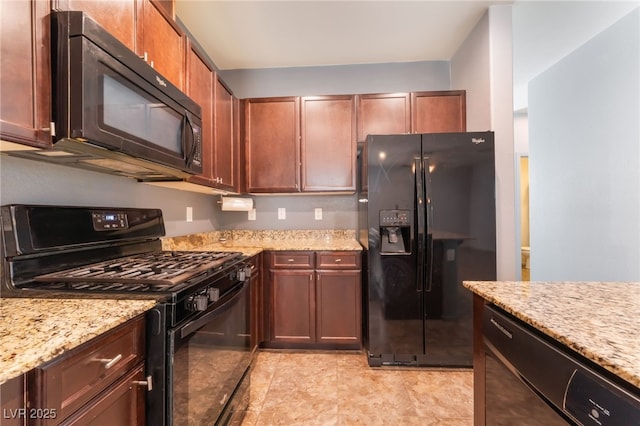 4610 Lime Straight Dr, Las Vegas, NV 89115 - kitchen with black appliances and light stone countertops