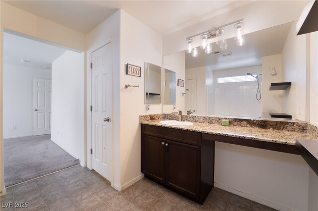 4610 Lime Straight Dr, Las Vegas, NV 89115 - full bath featuring vanity, a shower, and baseboards