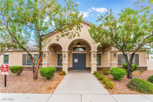 4610 Lime Straight Dr, Las Vegas, NV 89115 - view of front of property featuring stucco siding and stone siding