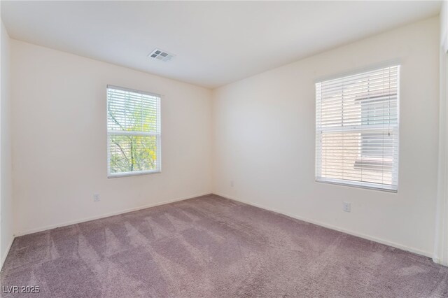 4610 Lime Straight Dr, Las Vegas, NV 89115 - carpeted empty room with baseboards