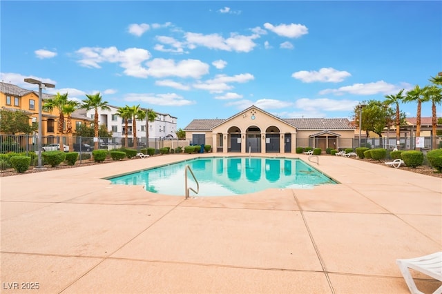 4610 Lime Straight Dr, Las Vegas, NV 89115 - community pool featuring a residential view and a patio