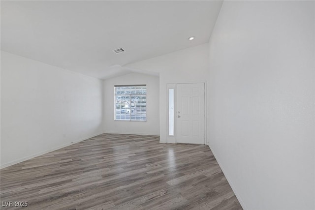 2410 Morocco Ave, North Las Vegas, NV 89031 - entrance foyer featuring lofted ceiling, wood finished floors, and recessed lighting