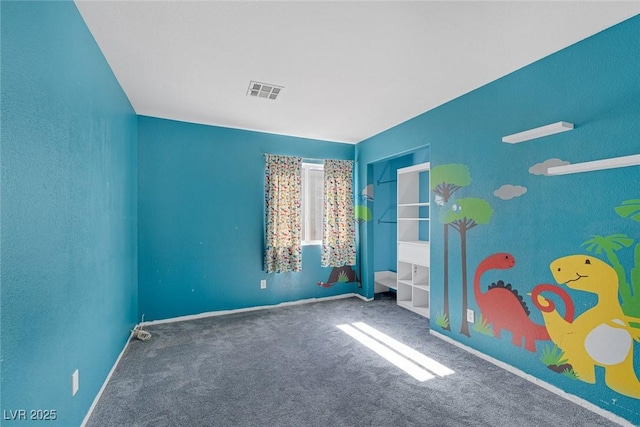 2410 Morocco Ave, North Las Vegas, NV 89031 - spare room featuring carpet and baseboards