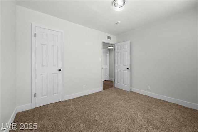 728 Carpenter Dr, Las Vegas, NV 89107 - unfurnished bedroom featuring carpet and baseboards