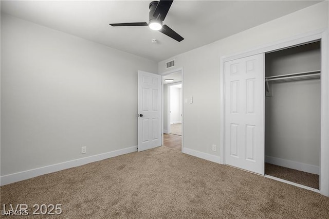 728 Carpenter Dr, Las Vegas, NV 89107 - unfurnished bedroom featuring carpet flooring, a closet, baseboards, and ceiling fan