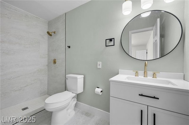 728 Carpenter Dr, Las Vegas, NV 89107 - bathroom with toilet, vanity, tiled shower, and baseboards
