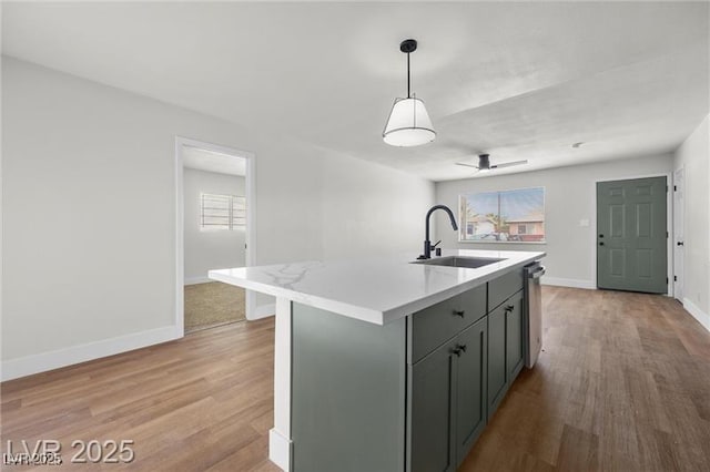 728 Carpenter Dr, Las Vegas, NV 89107 - kitchen with a sink, light wood finished floors, plenty of natural light, and stainless steel dishwasher