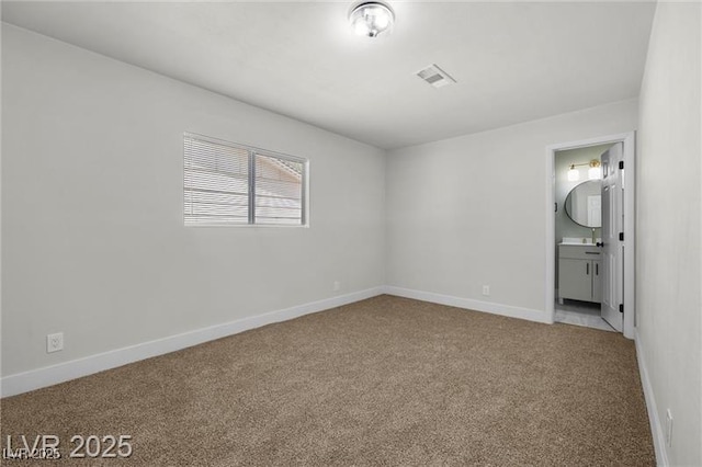 728 Carpenter Dr, Las Vegas, NV 89107 - unfurnished bedroom with carpet flooring and baseboards