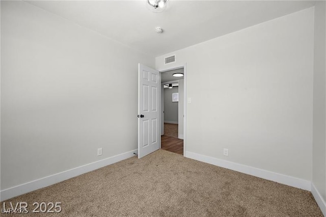 728 Carpenter Dr, Las Vegas, NV 89107 - unfurnished bedroom with carpet floors and baseboards