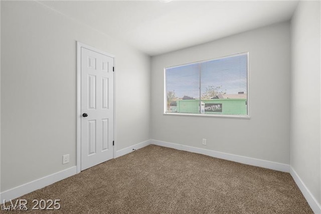 728 Carpenter Dr, Las Vegas, NV 89107 - carpeted spare room featuring baseboards