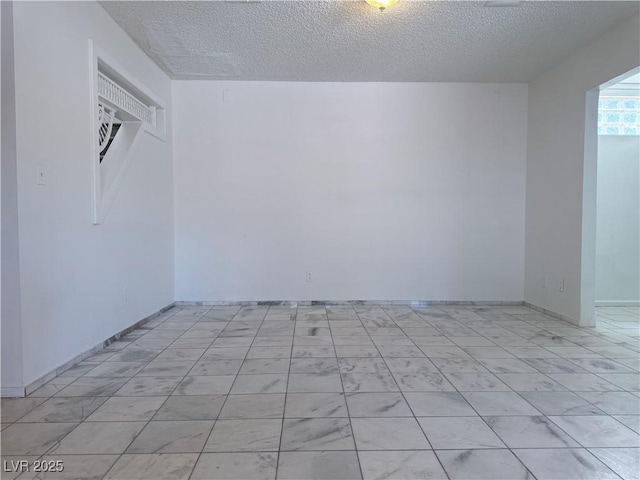 5600 Grossmont Ave, Las Vegas, NV 89110 - additional living space with a textured ceiling