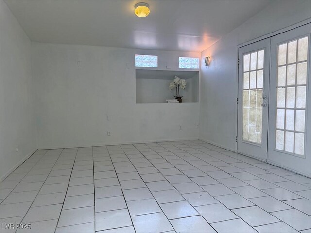 5600 Grossmont Ave, Las Vegas, NV 89110 - unfurnished room featuring french doors