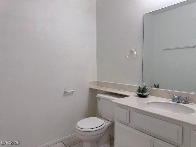5600 Grossmont Ave, Las Vegas, NV 89110 - bathroom with toilet, vanity, and tile patterned flooring