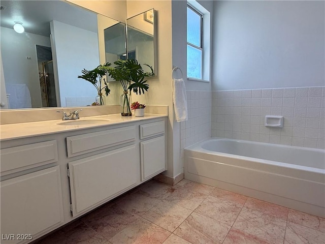 5600 Grossmont Ave, Las Vegas, NV 89110 - bathroom featuring a garden tub, vanity, and a shower with shower door