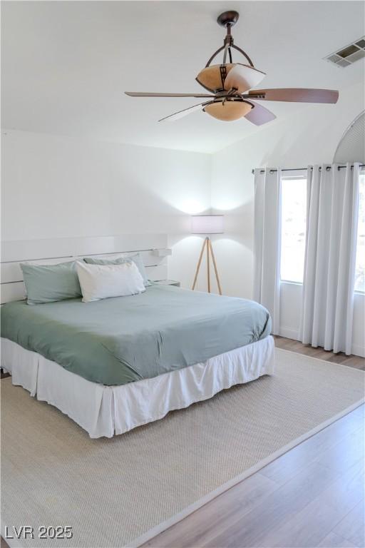 2549 Sundew Ave, Henderson, NV 89052 - bedroom with wood finished floors and a ceiling fan