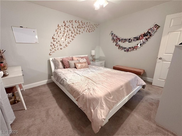 2549 Sundew Ave, Henderson, NV 89052 - bedroom featuring light colored carpet, baseboards, and a ceiling fan
