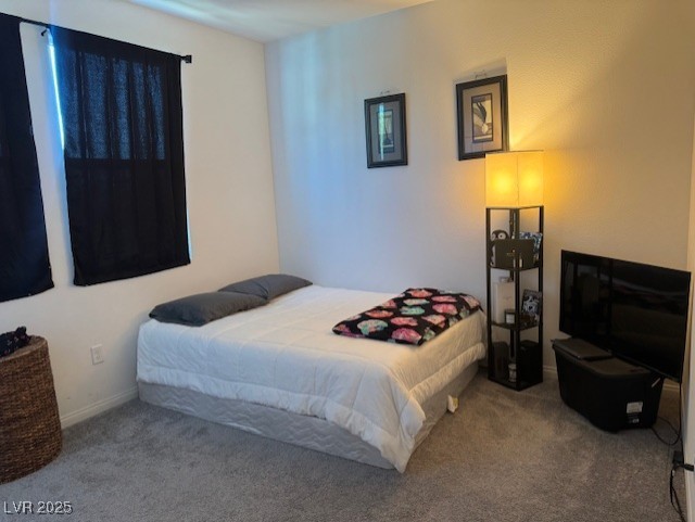 411 Hellebores Ave, North Las Vegas, NV 89084 - carpeted bedroom featuring baseboards