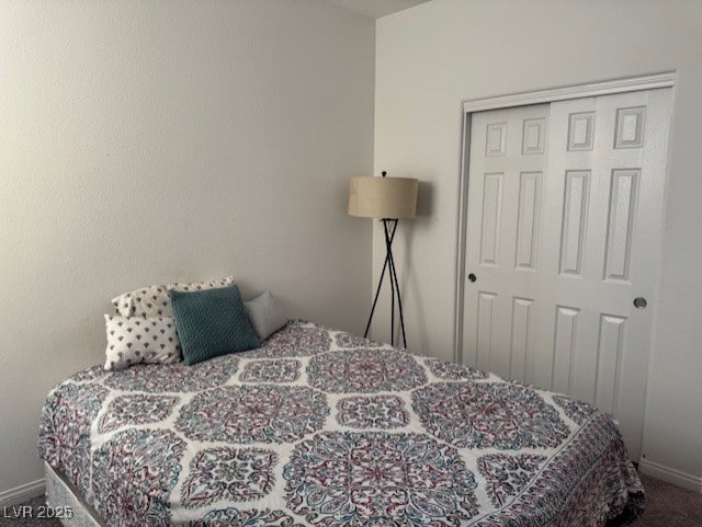 411 Hellebores Ave, North Las Vegas, NV 89084 - carpeted bedroom with baseboards and a closet