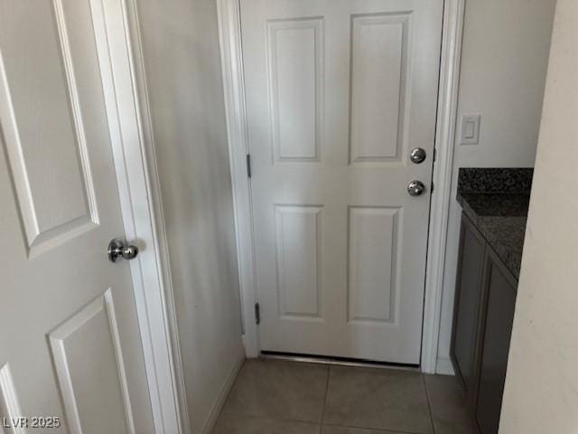 411 Hellebores Ave, North Las Vegas, NV 89084 - doorway to outside featuring light tile patterned floors
