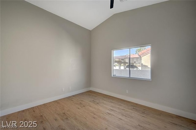 4010 Herblinda Ln, North Las Vegas, NV 89032 - unfurnished room with a ceiling fan, baseboards, lofted ceiling, and wood finished floors