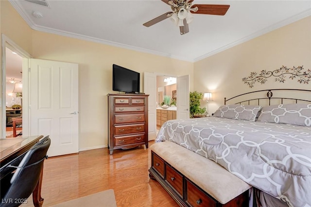 2545 Nashira St, Henderson, NV 89044 - bedroom featuring ornamental molding, light wood-type flooring, baseboards, ensuite bath, and a ceiling fan