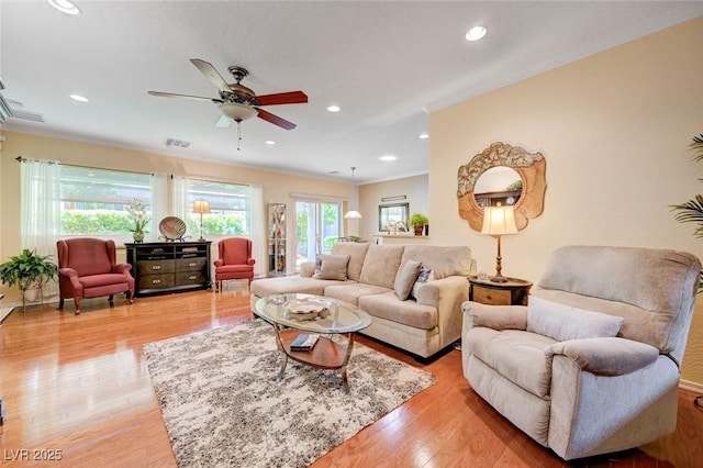 2545 Nashira St, Henderson, NV 89044 - living room with crown molding, ceiling fan, light wood-type flooring, and recessed lighting
