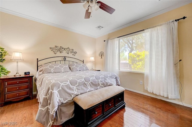 2545 Nashira St, Henderson, NV 89044 - bedroom featuring ornamental molding, wood finished floors, baseboards, and a ceiling fan