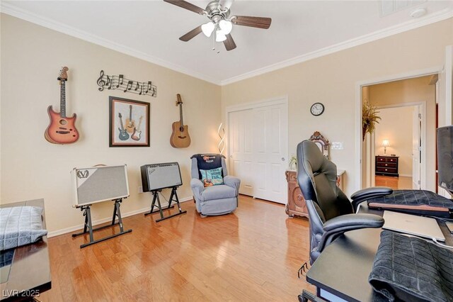 2545 Nashira St, Henderson, NV 89044 - office space with crown molding, a ceiling fan, light wood-type flooring, and baseboards
