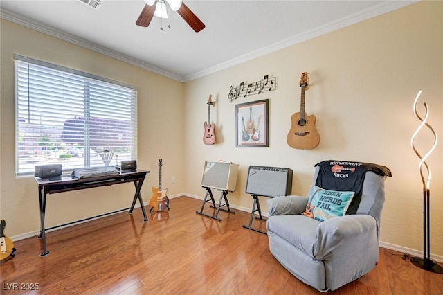 2545 Nashira St, Henderson, NV 89044 - living area featuring ornamental molding, ceiling fan, wood finished floors, an office area, and baseboards
