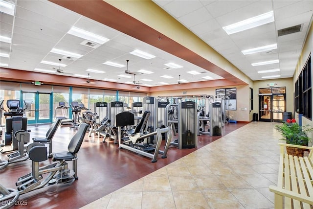 2545 Nashira St, Henderson, NV 89044 - workout area featuring a drop ceiling, french doors, and tile patterned floors