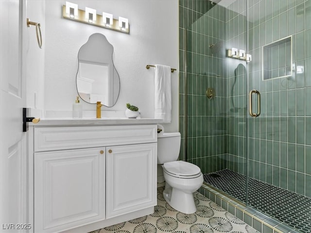 21 Sawgrass Ct, Las Vegas, NV 89113 - bathroom with vanity, a shower stall, toilet, and tile patterned floors
