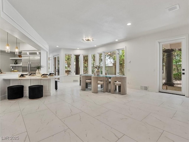 21 Sawgrass Ct, Las Vegas, NV 89113 - unfurnished living room featuring recessed lighting and light marble finish flooring