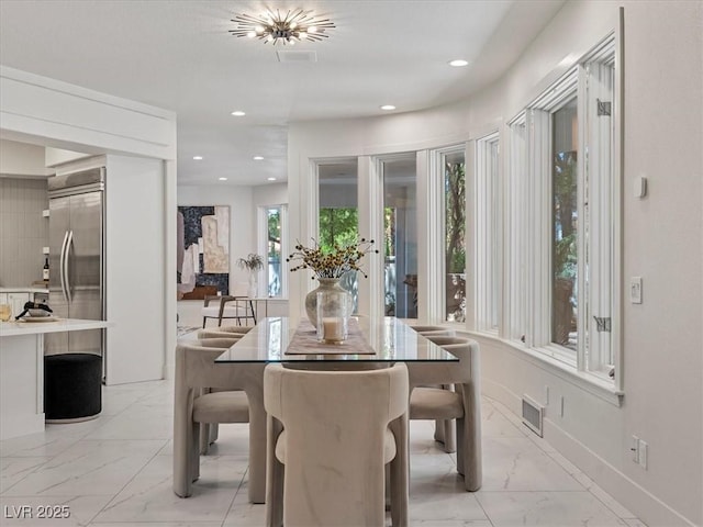21 Sawgrass Ct, Las Vegas, NV 89113 - dining space with light marble finish flooring, recessed lighting, and baseboards
