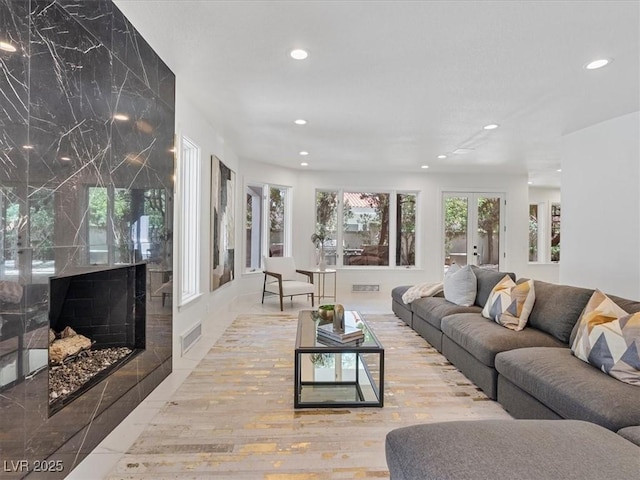 21 Sawgrass Ct, Las Vegas, NV 89113 - living room with recessed lighting, tile patterned flooring, and french doors