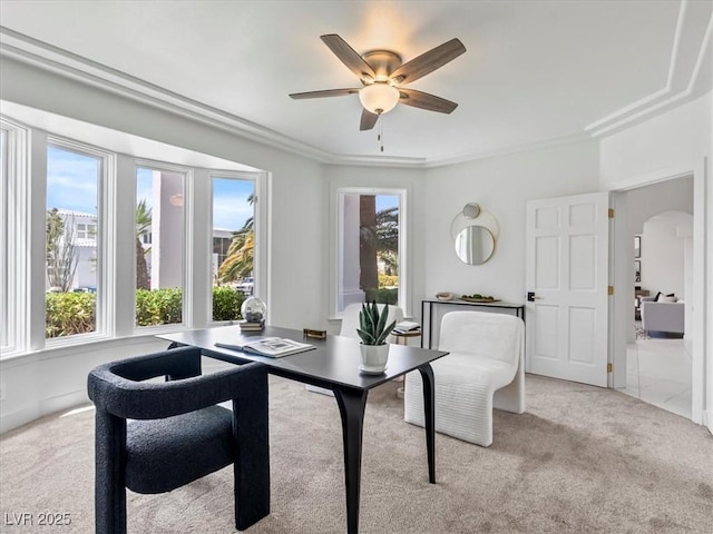 21 Sawgrass Ct, Las Vegas, NV 89113 - office with healthy amount of natural light, a ceiling fan, carpet flooring, arched walkways, and crown molding