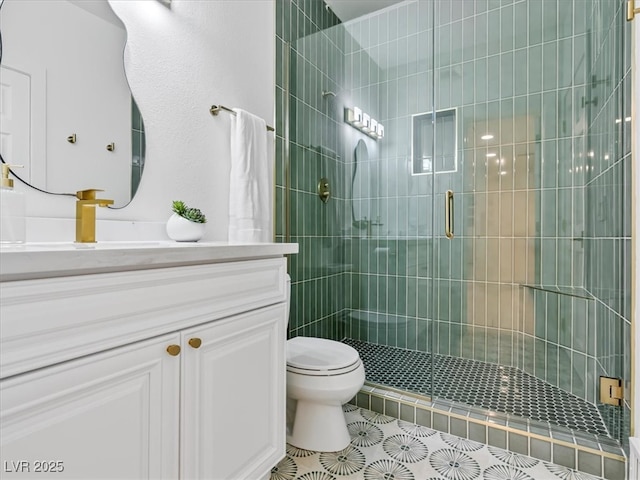 21 Sawgrass Ct, Las Vegas, NV 89113 - bathroom featuring vanity, a shower stall, toilet, and tile patterned floors