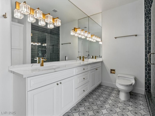21 Sawgrass Ct, Las Vegas, NV 89113 - bathroom featuring a shower stall, double vanity, and baseboards