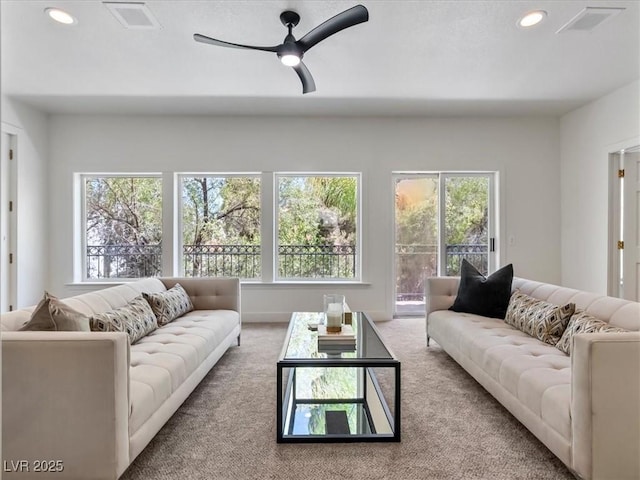 21 Sawgrass Ct, Las Vegas, NV 89113 - carpeted living room with recessed lighting and ceiling fan